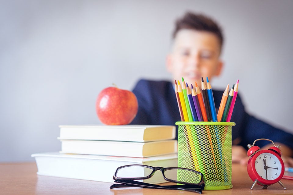 Apple on teachers desk